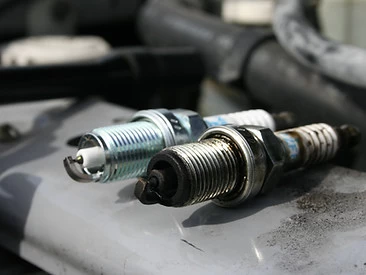 New and old spark plugs comparison